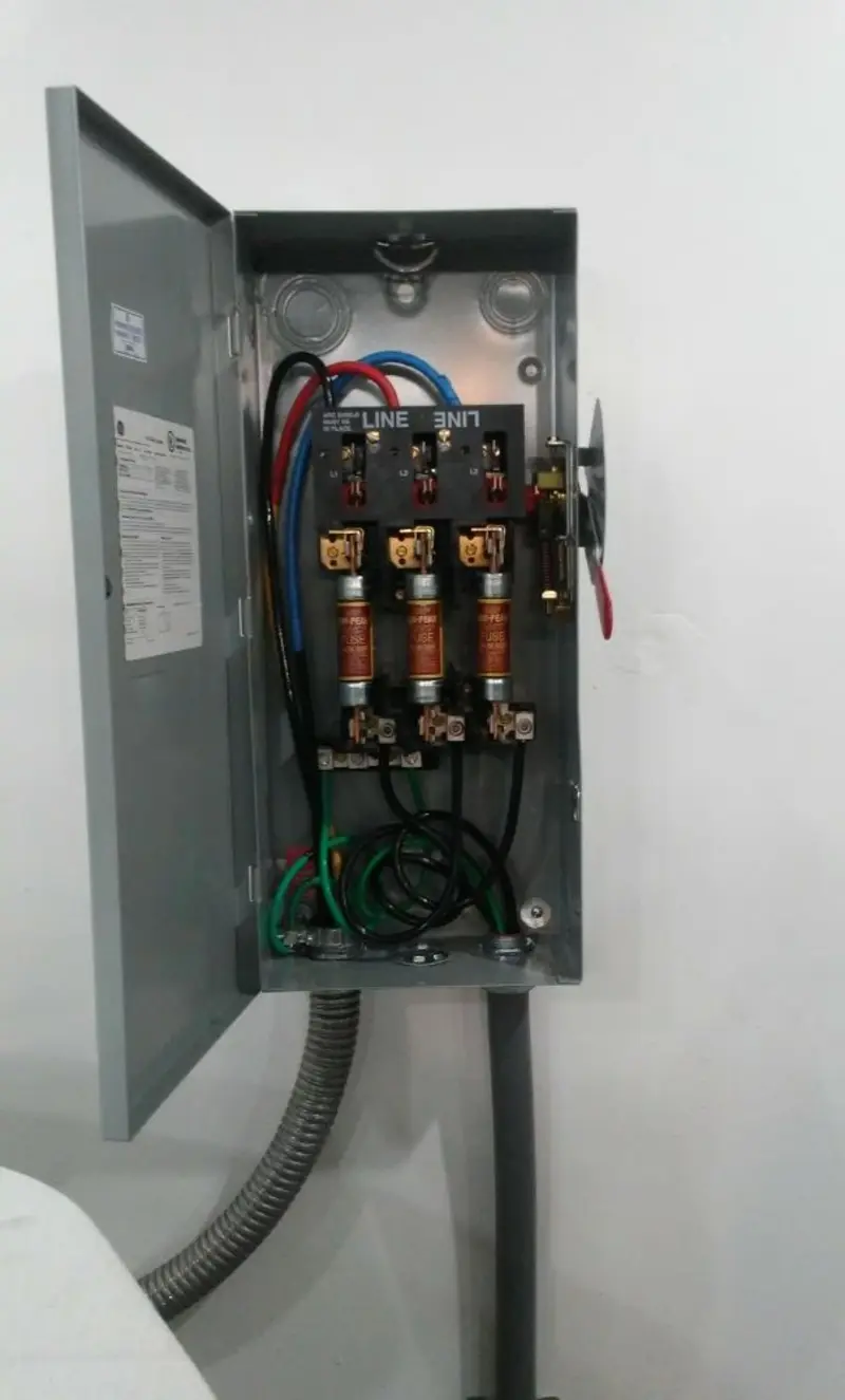 Three-phase disconnect switch installed for Smoke Detector Installation in Delhi